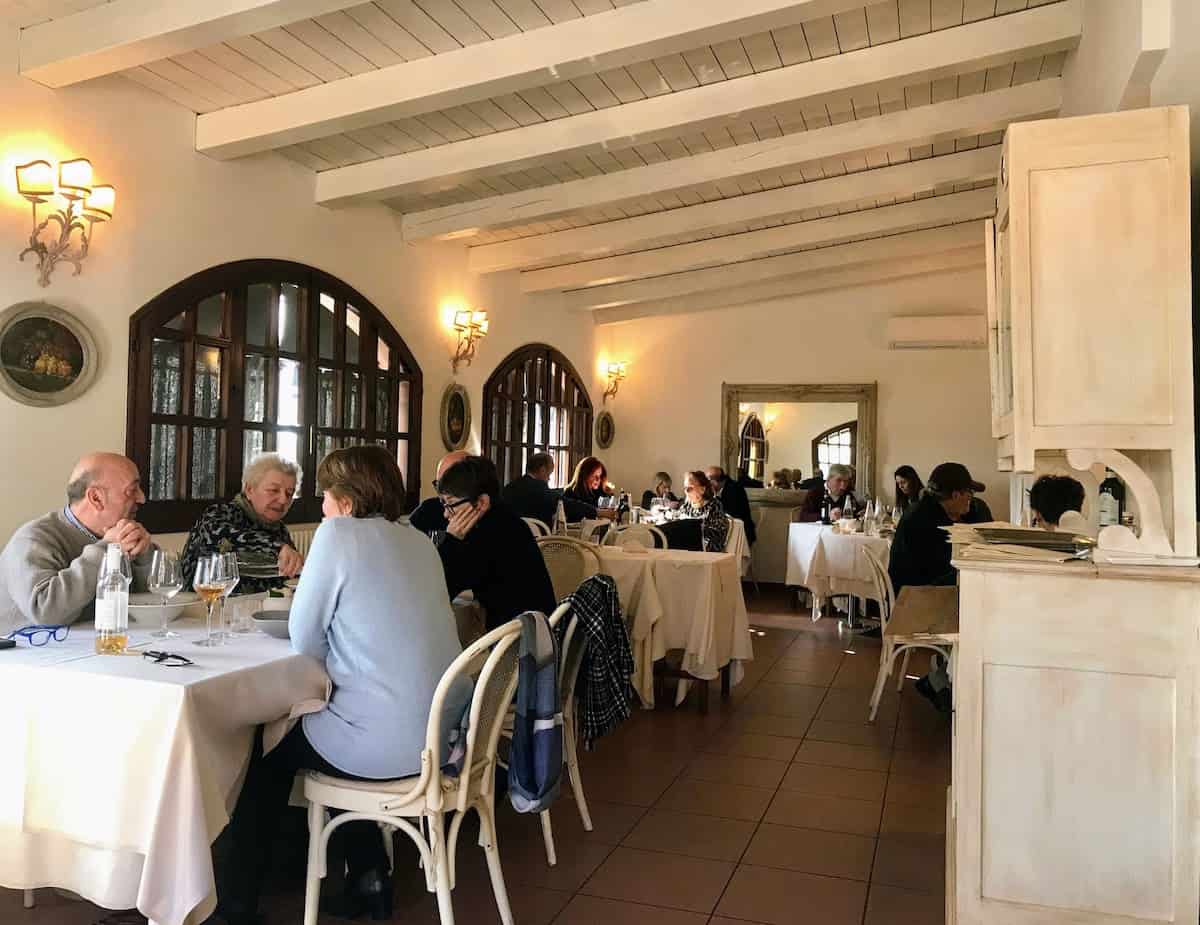 Light-filled dining room at Buriani Ristorante in Pieve di Cento