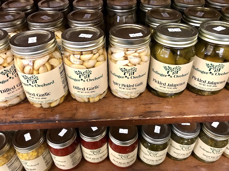 Shelves of delicacies including pickled vegetables