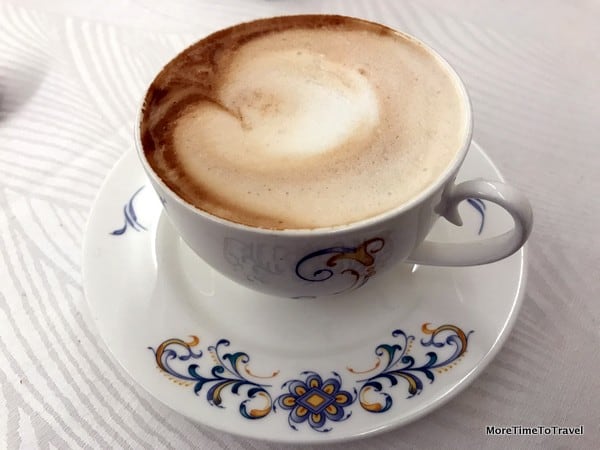 Waking up to cappuccino at the Art Hotel Commercianti