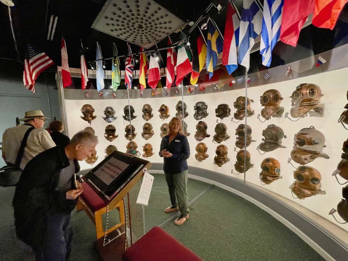 Display of diving helmets from many countries