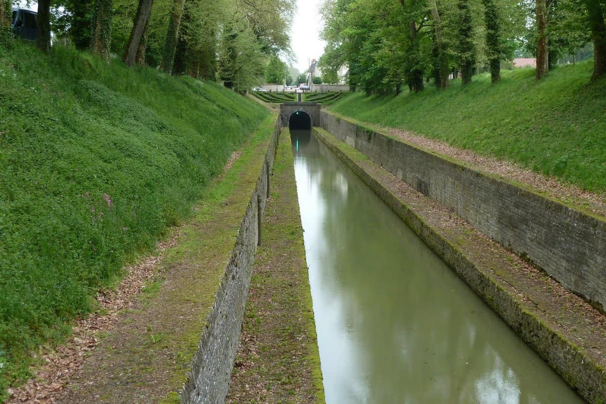 Entrance to tunnel marking the end of a section of the Canal