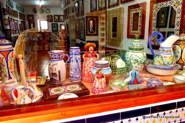 Window in one of the colorful pottery shops