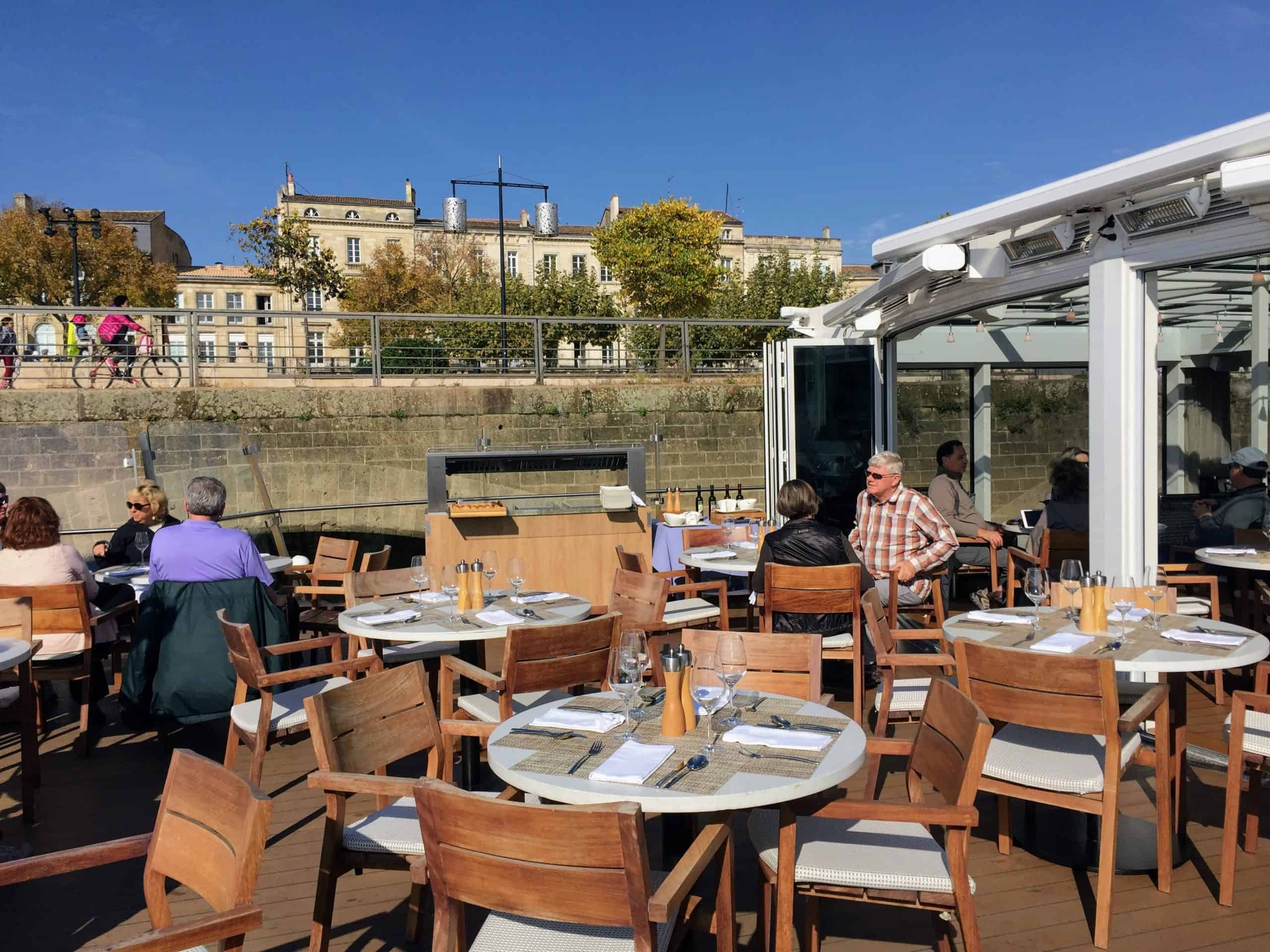 Intimate outdoor dining space on the Viking Forseti Longship in Bordeaux, France 